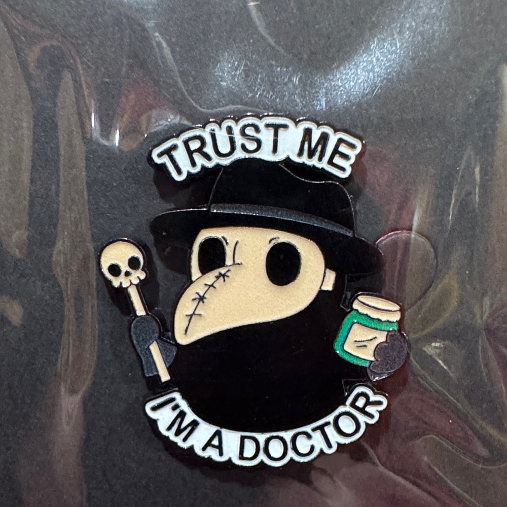 3 for $15 on select pins 
Black and White Doctor Brooch